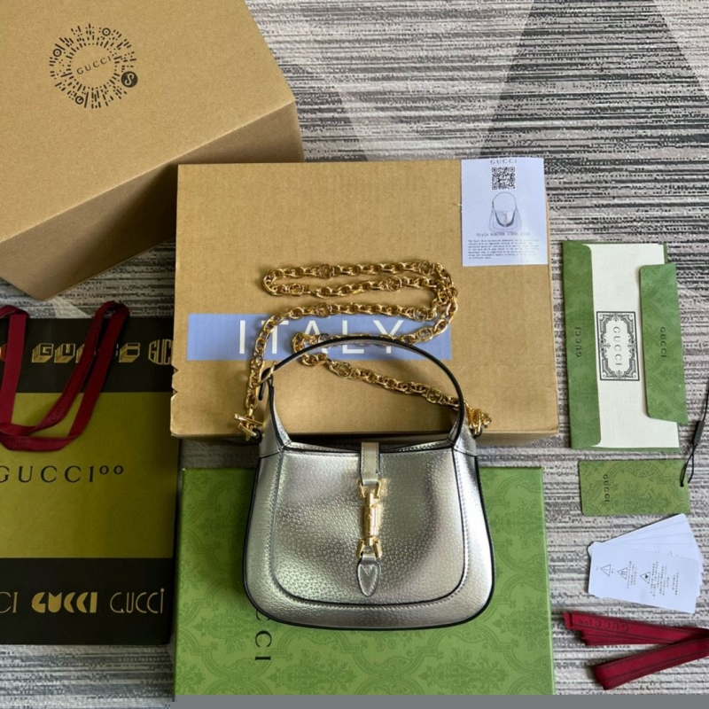 G*u*i top handle bags